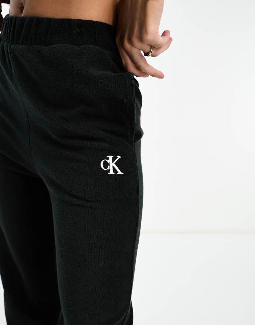 Calvin klein monogram hot sale sweatpants