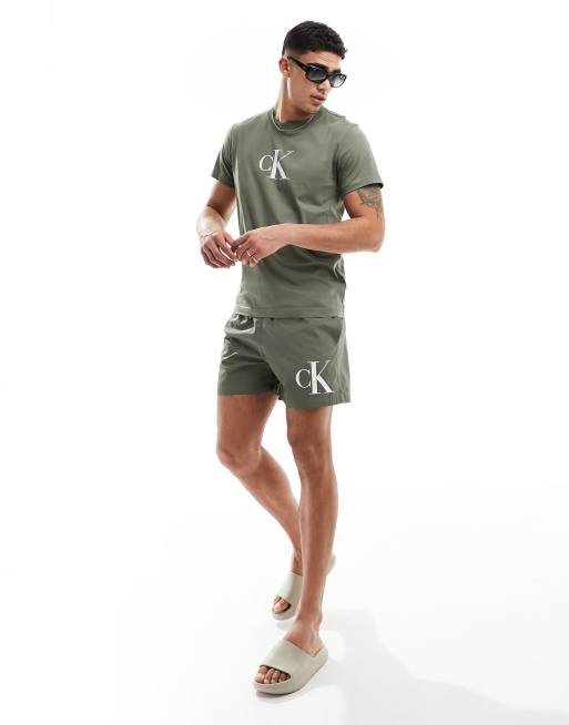 Calvin Klein Monogram Medium Drawstring Swim Shorts in olive Green