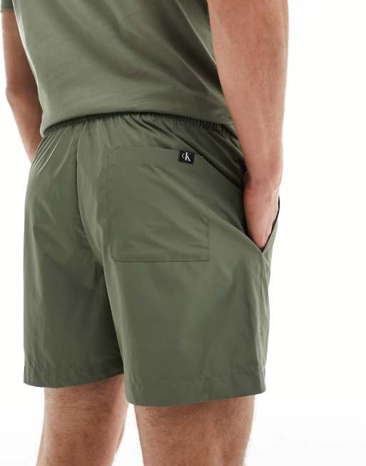Calvin Klein Monogram Medium Drawstring Swim Shorts in olive Green