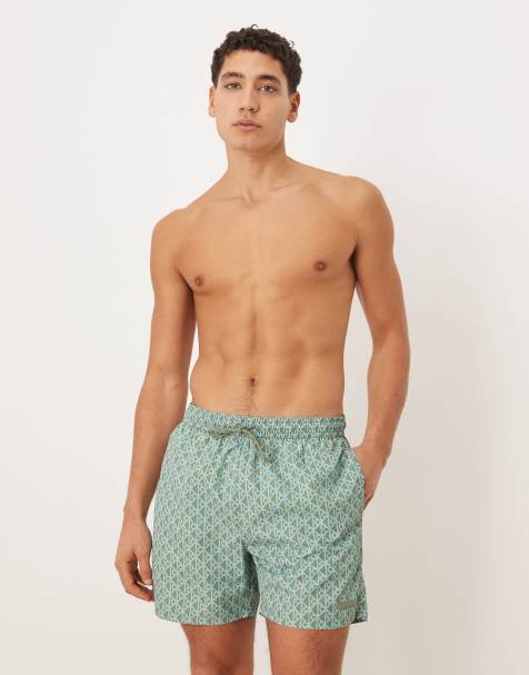 Calvin Klein monogram print drawstring swim shorts in blue - view 1