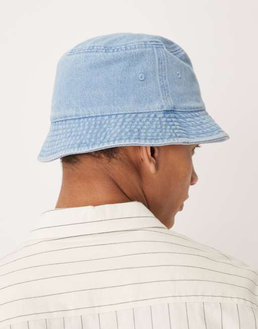 Calvin Klein Monologo embroidered denim bucket hat in light wash blue, 2 of 3