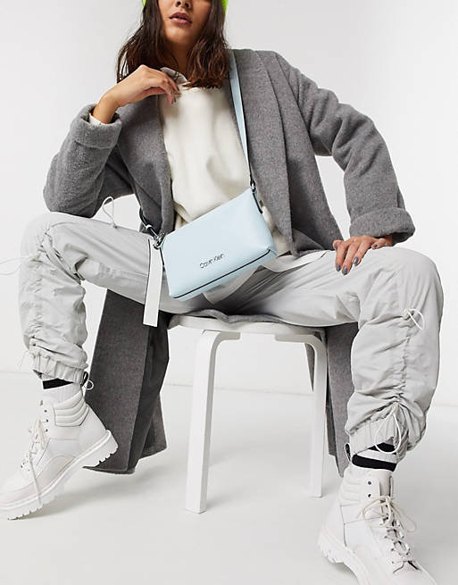 Calvin Klein Neat cross body bag in pastel blue | ASOS