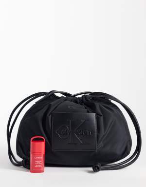Calvin Klein nylon drawstring crossbody bag with bold logo in black