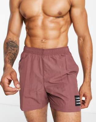 Calvin Klein nylon medium drawstring swim shorts in light brown - ASOS Price Checker