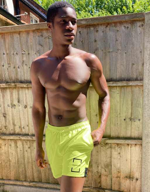 Neon yellow best sale swim shorts