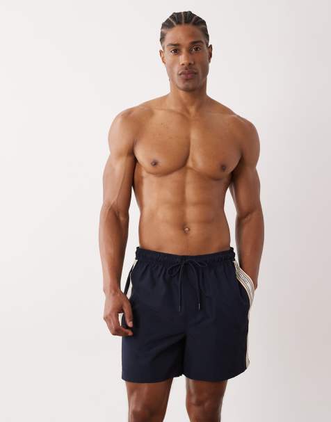 Calvin Klein - Pantaloncini da bagno blu navy scuro e pesca a righe con coulisse e fettuccia con logo - view 1