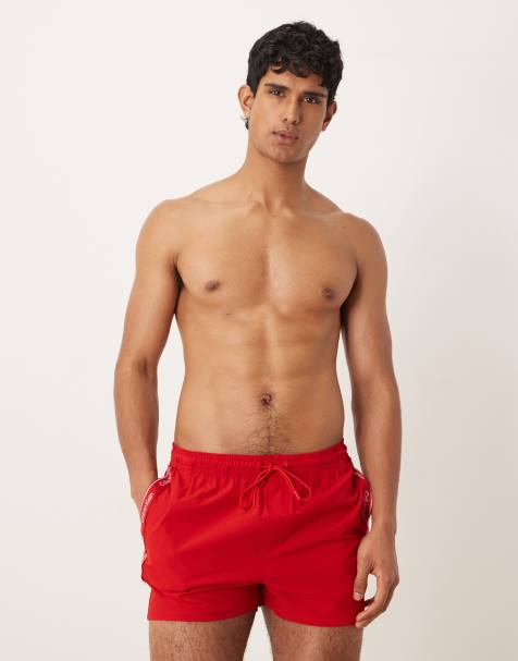 Calvin Klein - Pantaloncini da bagno rossi con coulisse e logo laterale - view 1