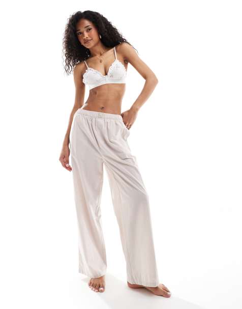 Calvin Klein - Pantaloni da casa a fondo ampio in cotone a righe con logo sulla fascia in vita - view 1