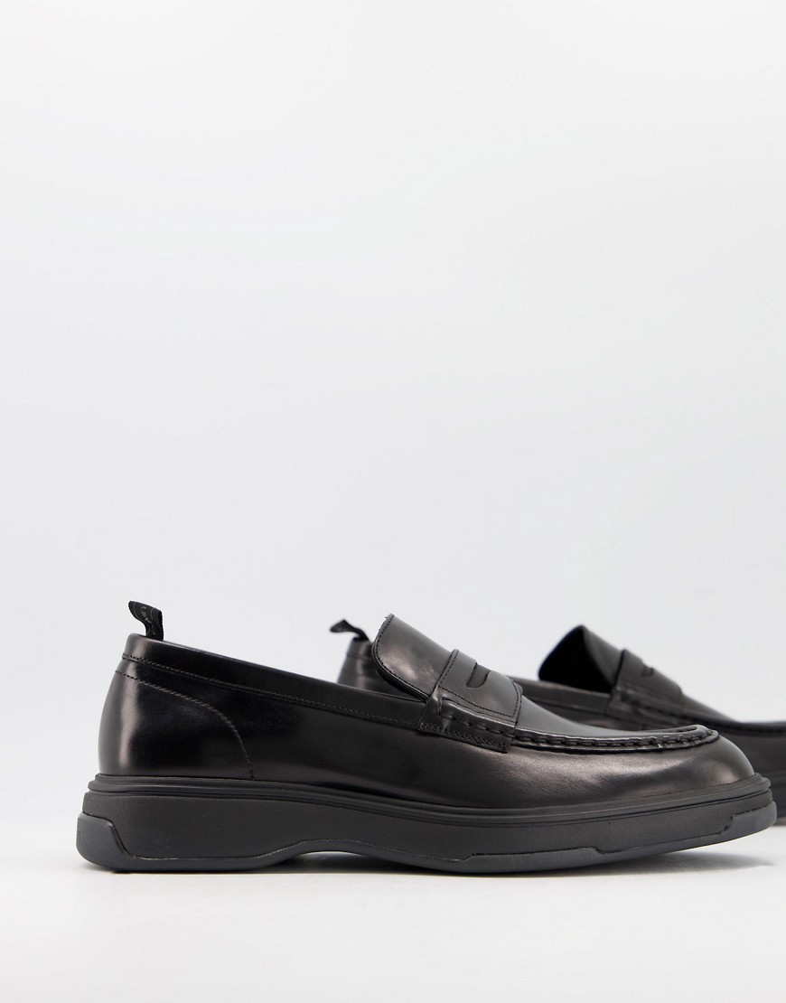 Calvin Klein Pegasus penny loafers in black leather