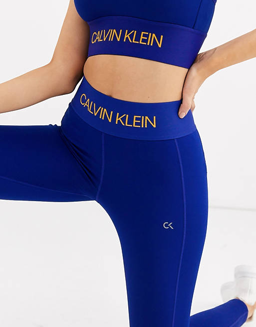 Calvin Klein Performance Active Icon logo waistband leggings in blue | ASOS