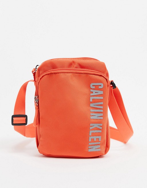 Calvin Klein Performance crossbody bag in hot coral