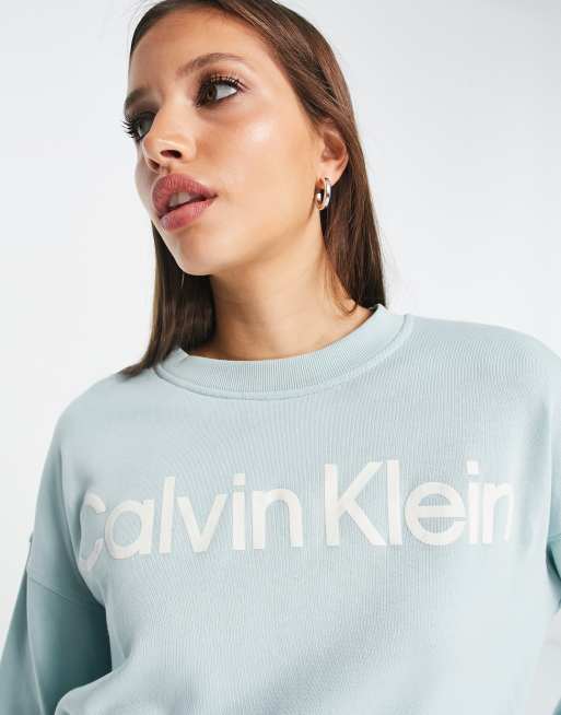 Calvin Klein Performance logo long sleeve sweatshirt in green | ASOS