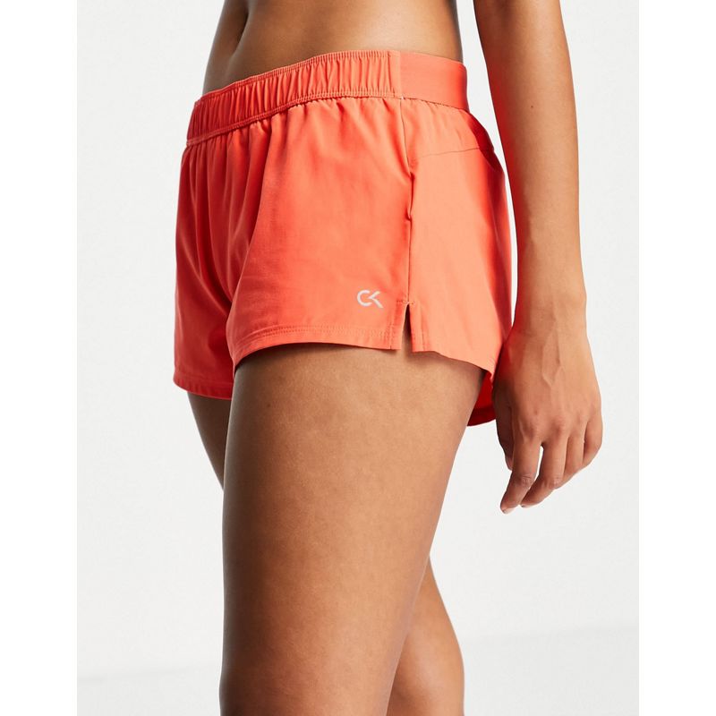 Activewear Palestra e allenamento Calvin Klein Performance - Coordinato con reggiseno sportivo e pantaloncini arancione