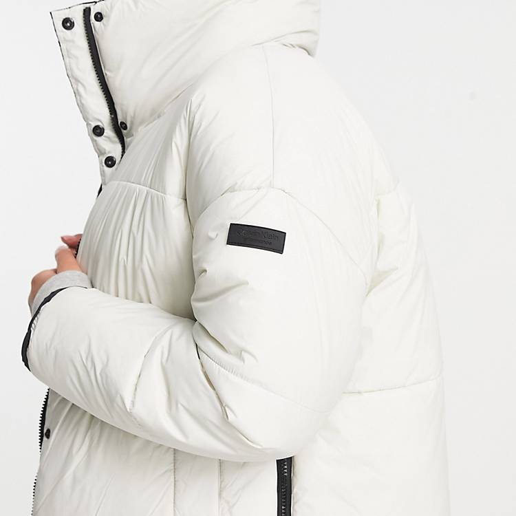 Calvin Klein Performance reversible oversized puffer coat in black/off white  | ASOS