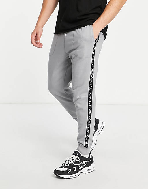 Calvin Klein Performance taping joggers in grey | ASOS