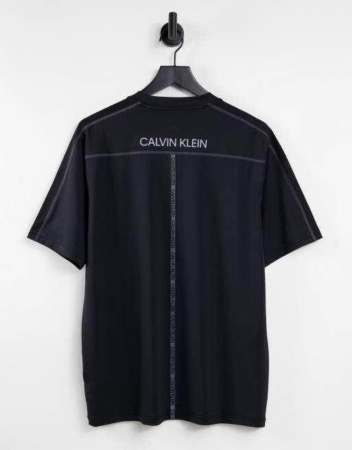 Calvin Klein Jeans logo tape shoulder t-shirt in black, ASOS