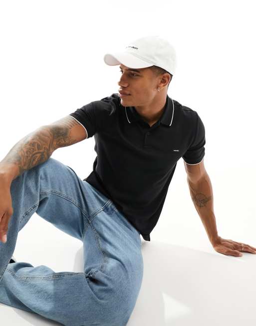 Calvin Klein – Pikee-Polohemd in Schwarz mit Zierstreifen und Stretchanteil