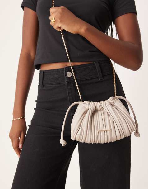Calvin Klein plisse drawstring shoulder bag in light grey - view 1