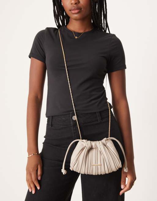 Calvin Klein plisse drawstring shoulder bag in light grey | ASOS
