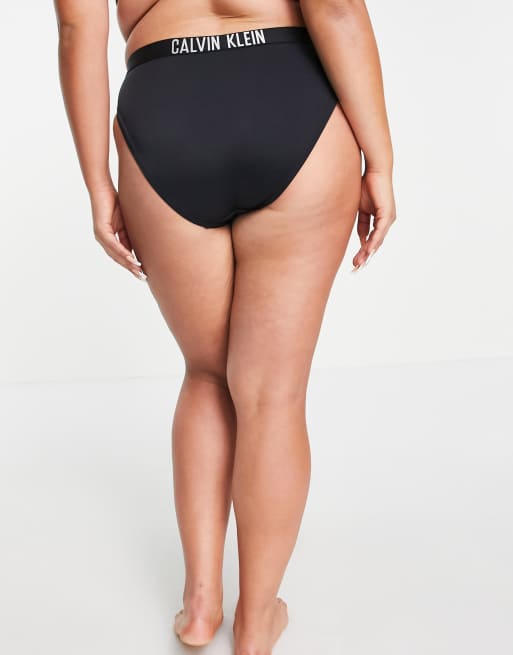 Calvin Klein - The Intense Power Plus Size Bralette Bikini Top and Bottom  Microfiber and mesh contrast in matte and glossy textures. Sport-inspired  silhouettes. Bold logo finish. See more swimwear here