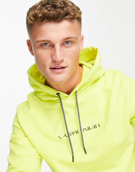 Calvin Klein print hoodie in yellow ASOS