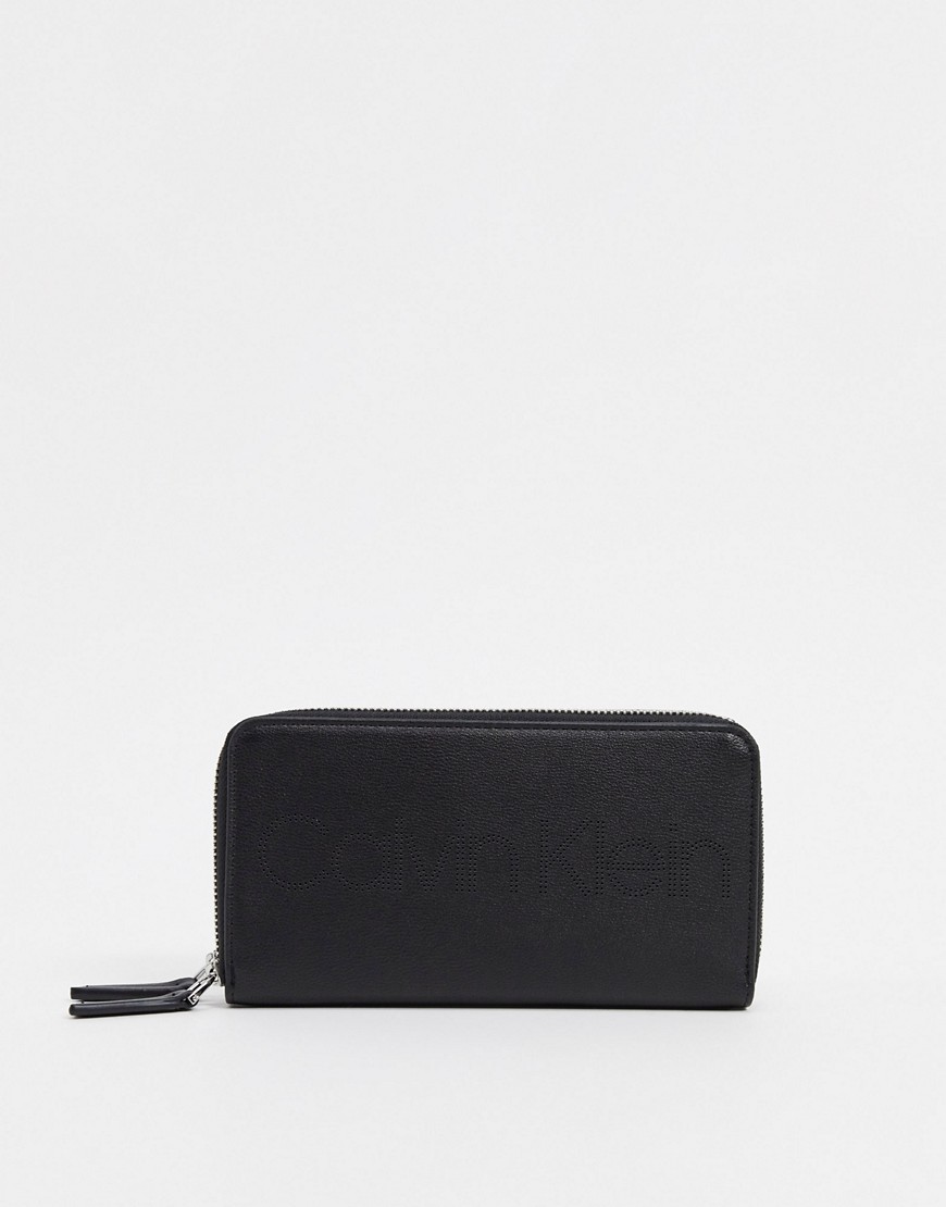 Calvin Klein punched logo purse in black