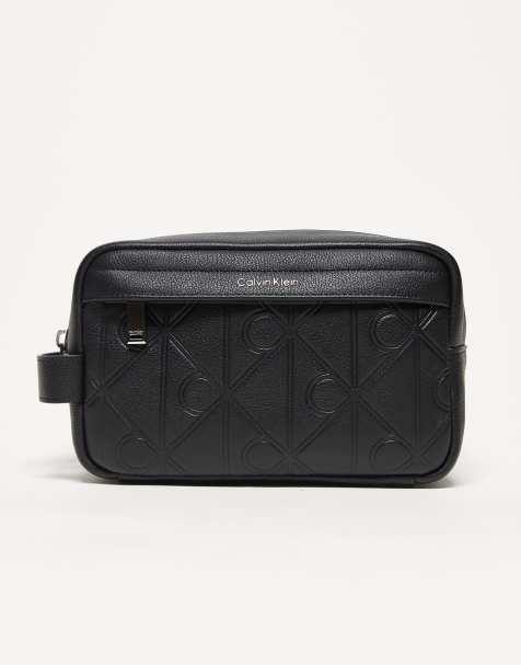 Calvin Klein real leather emblem wash bag in black - view 1