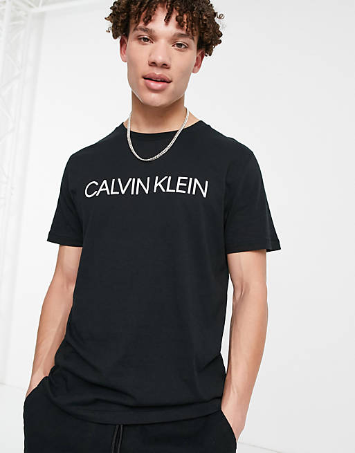 Calvin Klein relaxed fit swim T-shirt in black | ASOS