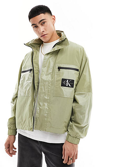 Calvin Klein Relaxed Utility Track Jacket in green | ASOS