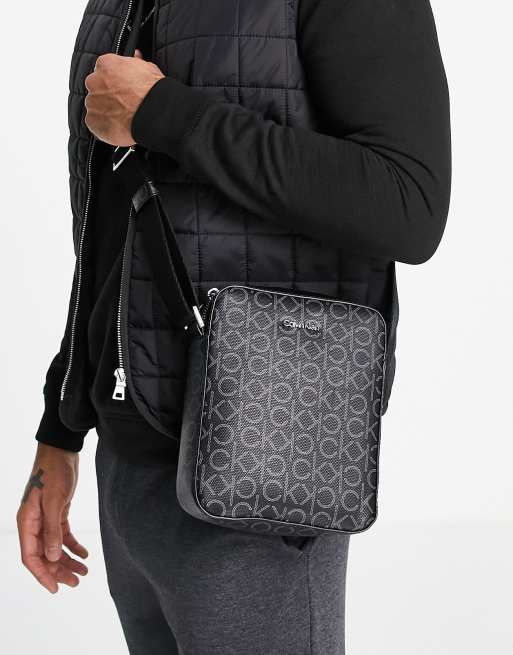 Calvin Klein repeat print flight bag in black