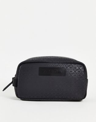 Calvin Klein repeat print wash bag In black