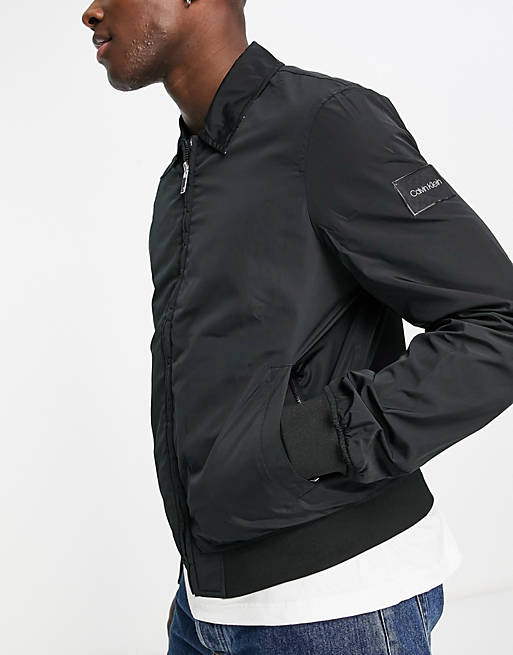 Calvin Klein reversible bomber jacket in black | ASOS