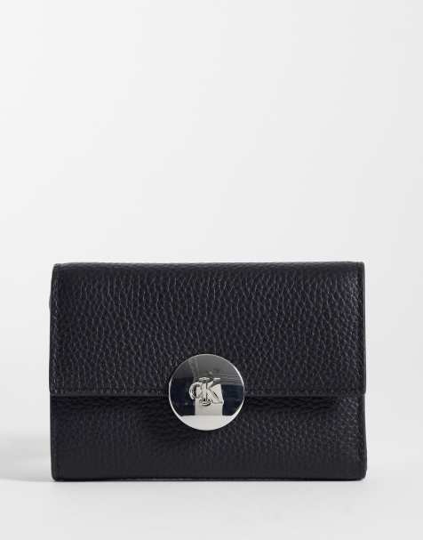 Calvin Klein round hardware pebble purse in black - view 1