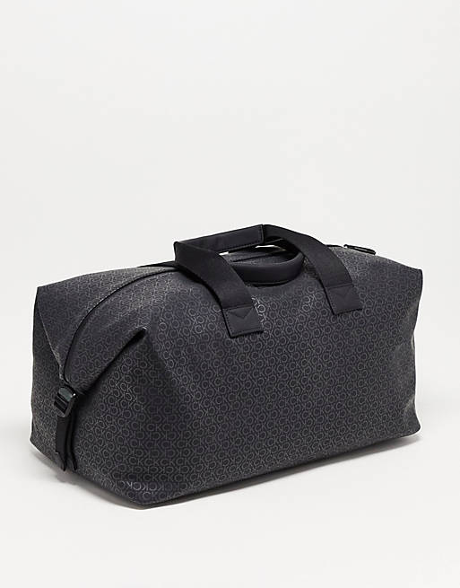 Calvin Klein rubberised monogram weekend bag in black