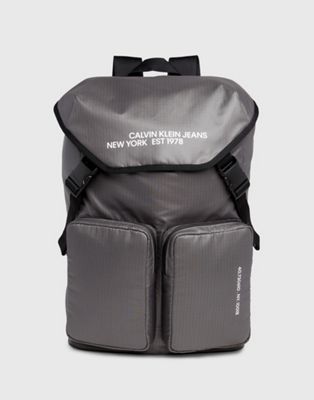 Calvin Klein Flap Backpack in grey - ASOS Price Checker