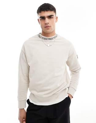 Calvin Klein Calvin Klein running logo comfort sweatshirt in beige - exclusive to ASOS-Black