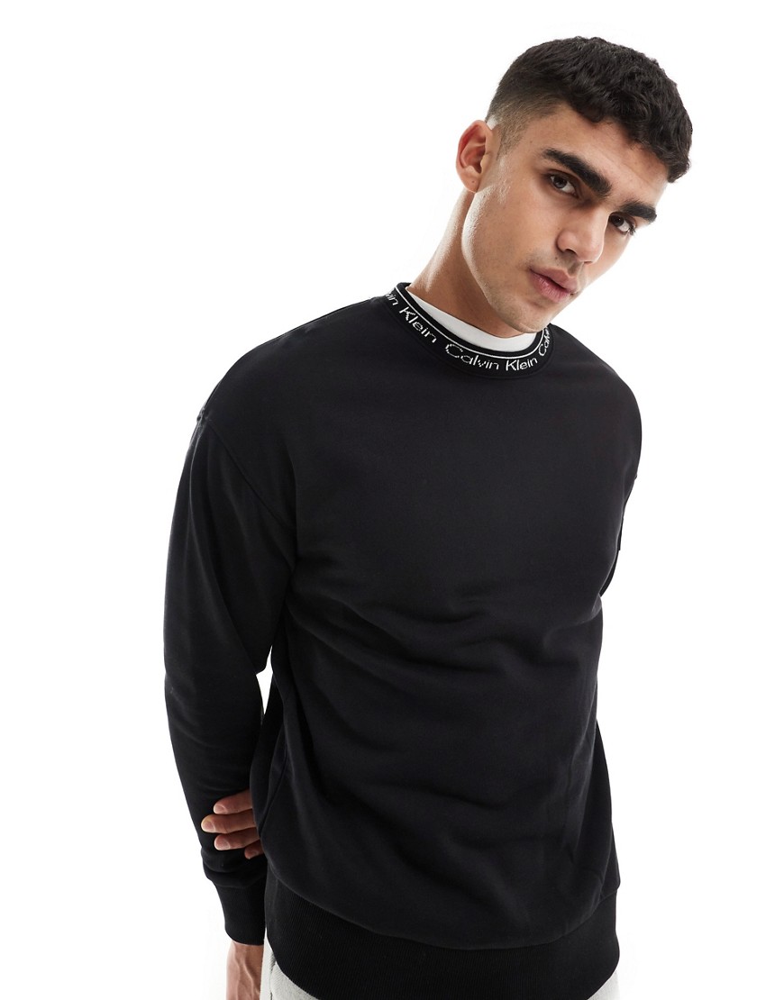 Calvin Klein running logo comfort sweatshirt in black - exclusive to ASOS