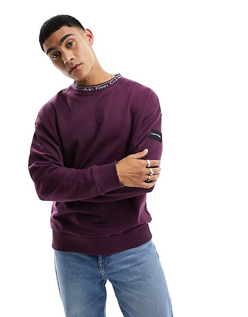 Calvin Klein running logo comfort sweatshirt in purple | ASOS