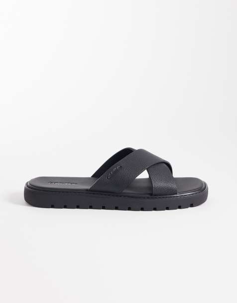 Calvin Klein – Sandalen aus echtem Leder in Schwarz mit überkreuzten Riemen - view 1