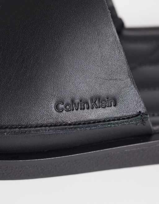 Calvin Klein - sandalias planas de piel con logo en relieve en negro, 2 de 4