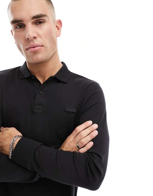 Calvin Klein – Schmal geschnittenes, langärmliges Polohemd in Schwarz