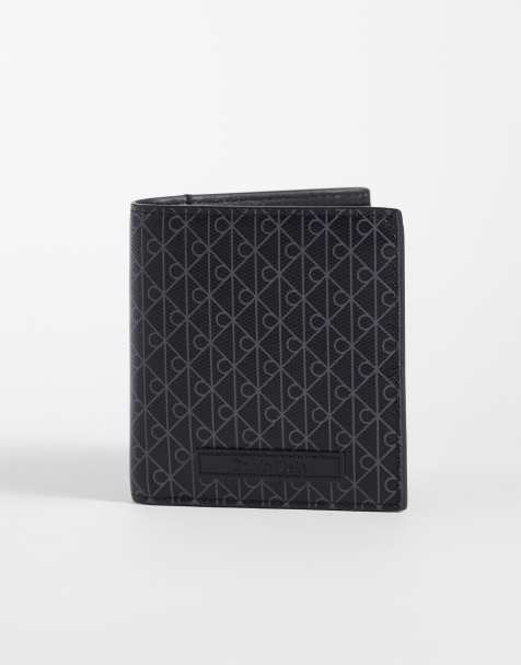 Calvin Klein – Schmale Brieftasche in Schwarz mit durchgehendem Emblem-Print - view 1