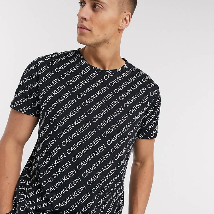 Calvin Klein – Schwarzes T-Shirt mit Rundhalsausschnitt und Logomuster |  ASOS