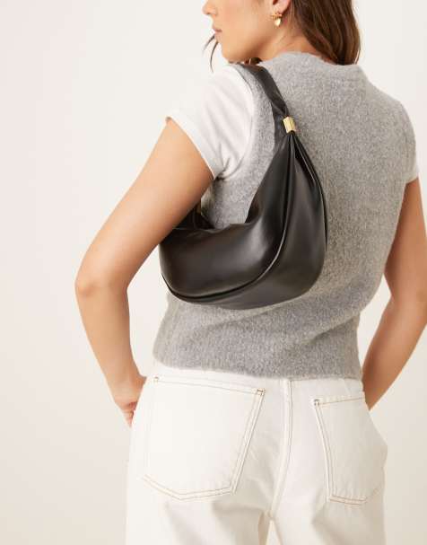 Calvin Klein scoop leather shoulder bag in black - view 1