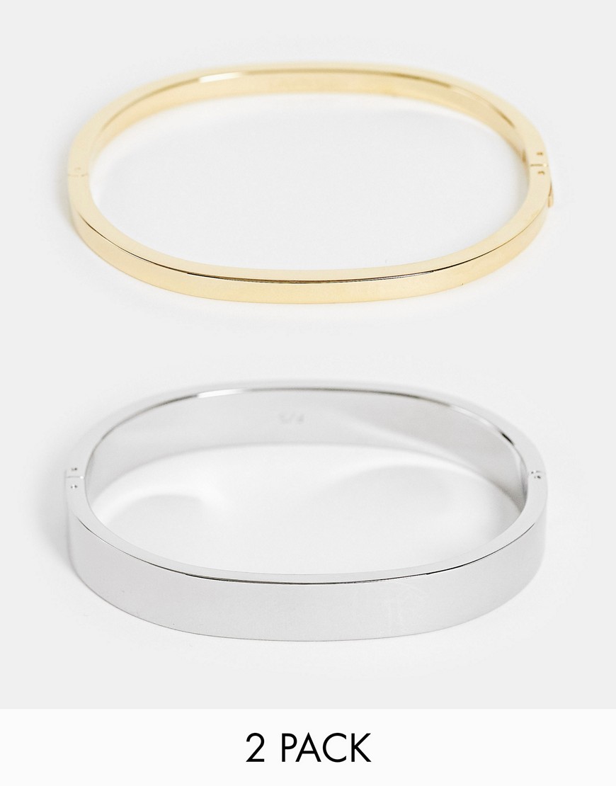 Calvin Klein set of bangles in silver and gold