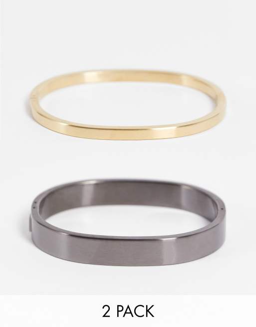 Calvin Klein - Set van armbanden in zwart en goudkleur