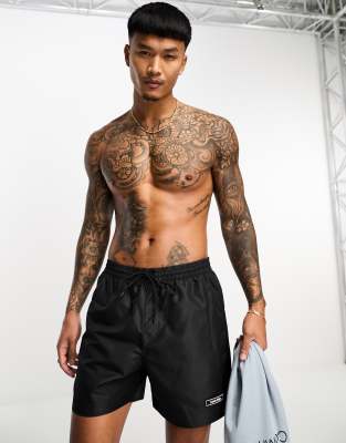 Calvin Klein core logo tape short drawstring swim shorts in black - ASOS Price Checker