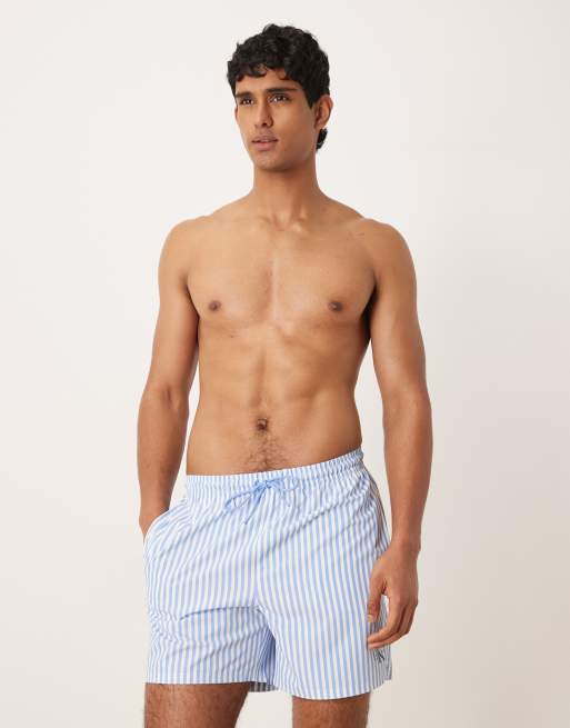 Calvin Klein - Short de bain rayé avec cordon de serrage à la taille - Bleu