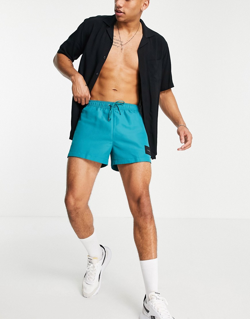 Calvin Klein short drawstring swim shorts in teal-Blues