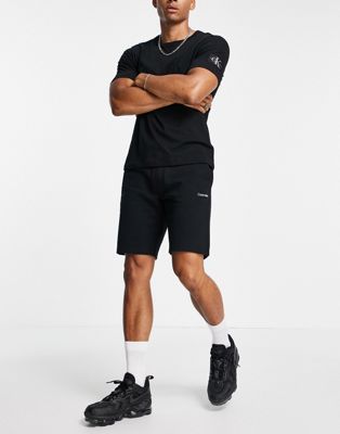 Marques de designers Calvin Klein - Short en molleton à petit logo brodé - Noir